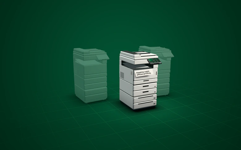 Illustration: the copier with two more machines standing behind it.